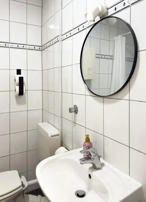 Ein Badezimmer in der Unterkunft Zentrales City-Apartment mit Free WiFi & Self Check-In & Balkon