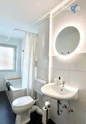 Ein Badezimmer in der Unterkunft BEGE APARTMENTS StaySmart