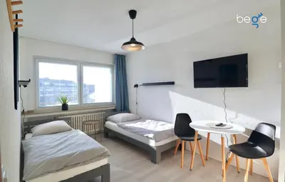Ein Bett oder Betten in einem Zimmer der Unterkunft BEGE APARTMENTS StaySmart