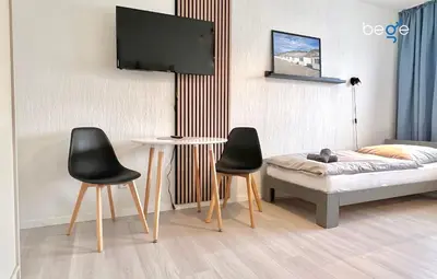 Ein Bett oder Betten in einem Zimmer der Unterkunft BEGE APARTMENTS StaySmart