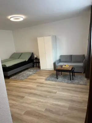 Ein Bett oder Betten in einem Zimmer der Unterkunft Ferienwohnung Ruhr