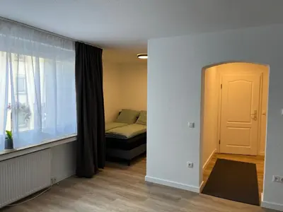 Ein Bett oder Betten in einem Zimmer der Unterkunft Ferienwohnung Ruhr