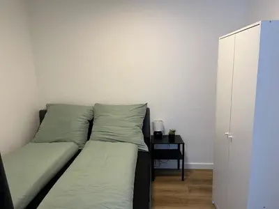 Ein Bett oder Betten in einem Zimmer der Unterkunft Ferienwohnung Ruhr