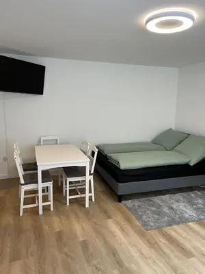 Ein Bett oder Betten in einem Zimmer der Unterkunft Ferienwohnung Ruhr