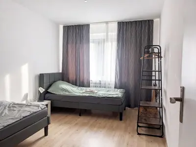 Ein Bett oder Betten in einem Zimmer der Unterkunft Beautiful Apartment in Velbert