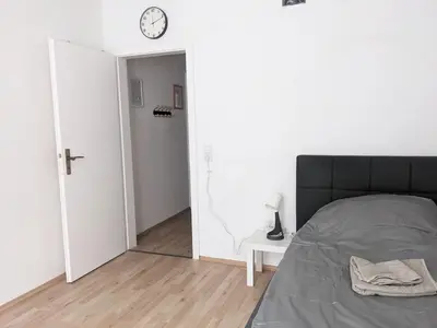 Ein Bett oder Betten in einem Zimmer der Unterkunft Beautiful Apartment in Velbert