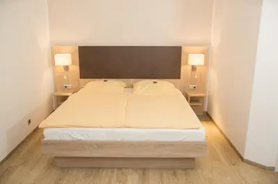 Ein Bett oder Betten in einem Zimmer der Unterkunft Hotel Restaurant Lütkebohmert