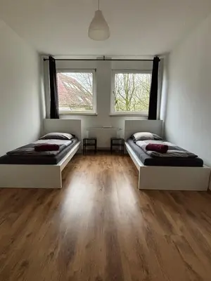 Ein Bett oder Betten in einem Zimmer der Unterkunft Case Five Aparthotel mit Parkplatz
