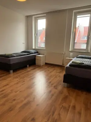 Ein Bett oder Betten in einem Zimmer der Unterkunft Case Five Aparthotel mit Parkplatz