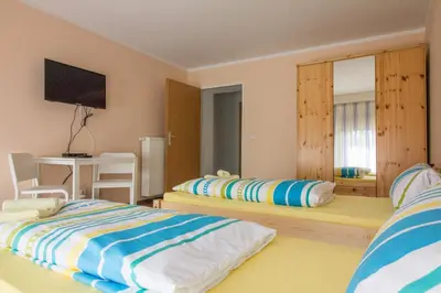 Ein Bett oder Betten in einem Zimmer der Unterkunft City Apartments Herne