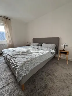 Ein Bett oder Betten in einem Zimmer der Unterkunft Gemütliche 2 Zimmer Wohnung in bester Lage