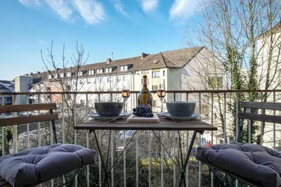 Ein Balkon oder eine Terrasse in der Unterkunft EssenFusion Wasserturm - Innenstadt nahe der Messe, SmartTV, Nespresso, Fully Kitchen