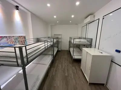 Ein Bett oder Betten in einem Zimmer der Unterkunft Fuchsbau Event- und Fotoapartment
