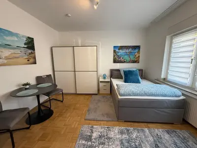 Ein Bett oder Betten in einem Zimmer der Unterkunft Justyna 1 Zimmer Freistehendes, ruhiges Haus nur 2 miter