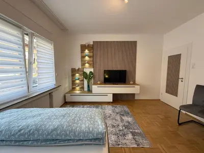 Ein Bett oder Betten in einem Zimmer der Unterkunft Justyna 1 Zimmer Freistehendes, ruhiges Haus nur 2 miter