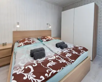 Ein Bett oder Betten in einem Zimmer der Unterkunft Ferienwohnung Yvonne