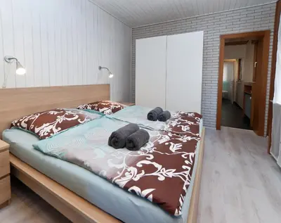 Ein Bett oder Betten in einem Zimmer der Unterkunft Ferienwohnung Yvonne