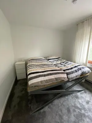 Ein Bett oder Betten in einem Zimmer der Unterkunft Ground floor apartment in Marl