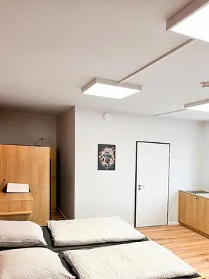 Ein Bett oder Betten in einem Zimmer der Unterkunft Erlebniswelt Resort Apartment 9