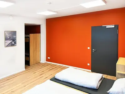 Ein Bett oder Betten in einem Zimmer der Unterkunft Erlebniswelt Resort Apartment 10