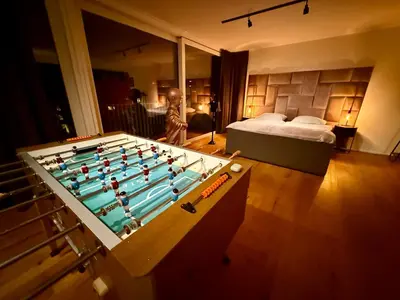 Ein Bett oder Betten in einem Zimmer der Unterkunft Stilvolles 007 Penthouse nähe Düsseldorf Köln