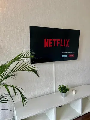 TV/Unterhaltungsangebot in der Unterkunft City Apartment 5 min A46 - Parkplatz,Wifi,Netflix,Self check-in