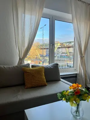 Ein Sitzbereich in der Unterkunft City Apartment 5 min A46 - Parkplatz,Wifi,Netflix,Self check-in