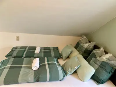 Ein Bett oder Betten in einem Zimmer der Unterkunft Royal Home - Geräumige Ferienwohnung mit Balkon nahe Seepark Lünen und Dortmund!