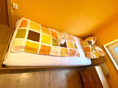 Ein Bett oder Betten in einem Zimmer der Unterkunft Royal Home - Geräumige Ferienwohnung mit Balkon nahe Seepark Lünen und Dortmund!