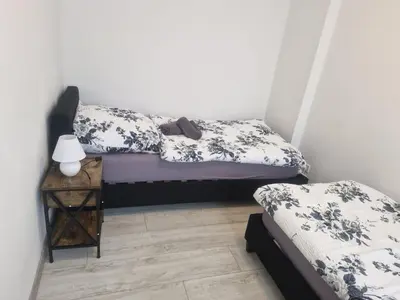 Ein Bett oder Betten in einem Zimmer der Unterkunft Altes Sägewerk 2