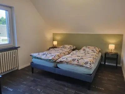 Ein Bett oder Betten in einem Zimmer der Unterkunft Wohnung in Duisburg-Baerl