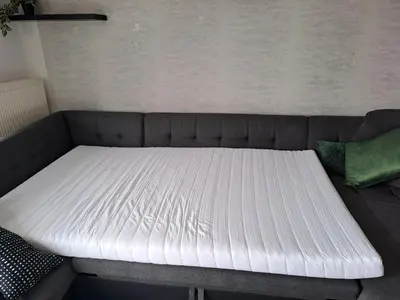 Ein Bett oder Betten in einem Zimmer der Unterkunft Ferienwohnug mit Balkon und Carport