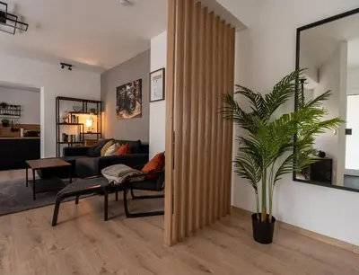 Ein Sitzbereich in der Unterkunft Apart79-Indust Design I Garden with Terrace I Smart TV I Free Parking I Free WiFi