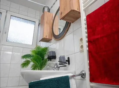 Ein Badezimmer in der Unterkunft Livemore24 - Apartment 1 in Herten West 24-7 Check-in