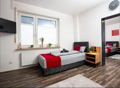Ein Bett oder Betten in einem Zimmer der Unterkunft Livemore24 - Apartment 1 in Herten West 24-7 Check-in