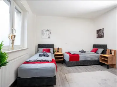 Ein Bett oder Betten in einem Zimmer der Unterkunft Livemore24 - Apartment 2 in Herten West 24-7 Check-in