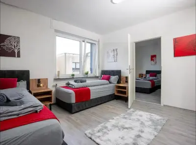 Ein Bett oder Betten in einem Zimmer der Unterkunft Livemore24 - Apartment 3 in Herten West 24-7 Check-in