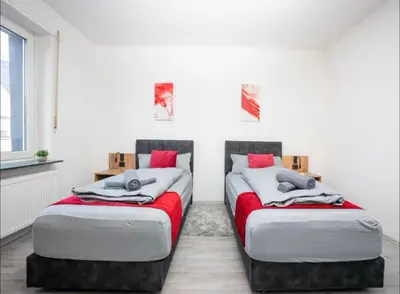 Ein Bett oder Betten in einem Zimmer der Unterkunft Livemore24 - Apartment 3 in Herten West 24-7 Check-in