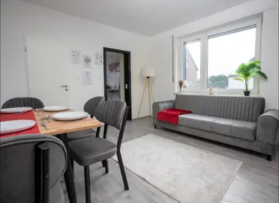 Ein Sitzbereich in der Unterkunft Livemore24 - Apartment 3 in Herten West 24-7 Check-in
