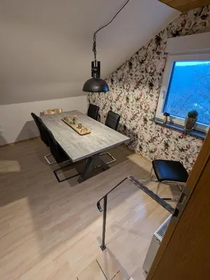 Ein Sitzbereich in der Unterkunft Ferienwohnung am Steinweg