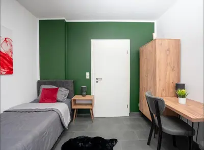 Ein Bett oder Betten in einem Zimmer der Unterkunft Livemore24 - Apartment 1 in Oer-Erkenschwick WLAN