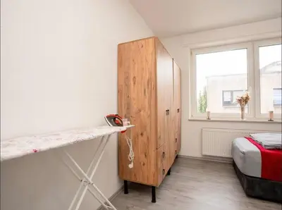 Ein Bett oder Betten in einem Zimmer der Unterkunft Livemore24 - Apartment 4 in Herten West 24-7 Check-in