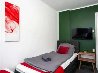 Ein Bett oder Betten in einem Zimmer der Unterkunft Livemore24 - Apartment 2 in Oer-Erkenschwick WLAN