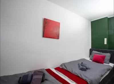 Ein Bett oder Betten in einem Zimmer der Unterkunft Livemore24 - Apartment 2 in Oer-Erkenschwick WLAN