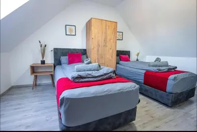 Ein Bett oder Betten in einem Zimmer der Unterkunft Livemore24 - Apartment 5 in Herten West 24-7 Check-in