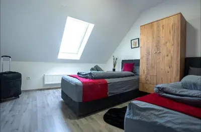 Ein Bett oder Betten in einem Zimmer der Unterkunft Livemore24 - Apartment 5 in Herten West 24-7 Check-in