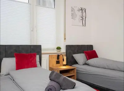 Ein Sitzbereich in der Unterkunft Livemore24 - Space in Herten West 24-7 Check-in