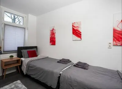Ein Bett oder Betten in einem Zimmer der Unterkunft Livemore24 - Space in Oer-Erkenschwick WLAN