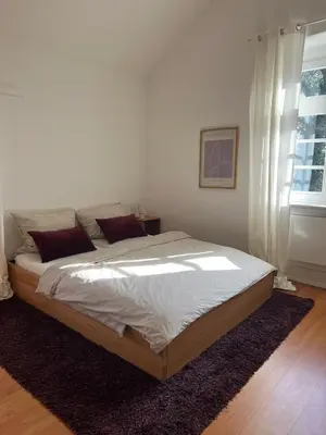 Ein Bett oder Betten in einem Zimmer der Unterkunft Das Ministerhaus - exklusives Apartment auf historischem Gutshof