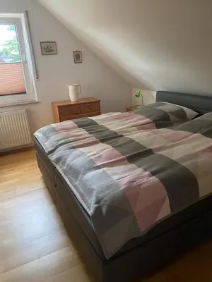 Ein Bett oder Betten in einem Zimmer der Unterkunft Haus Datteln